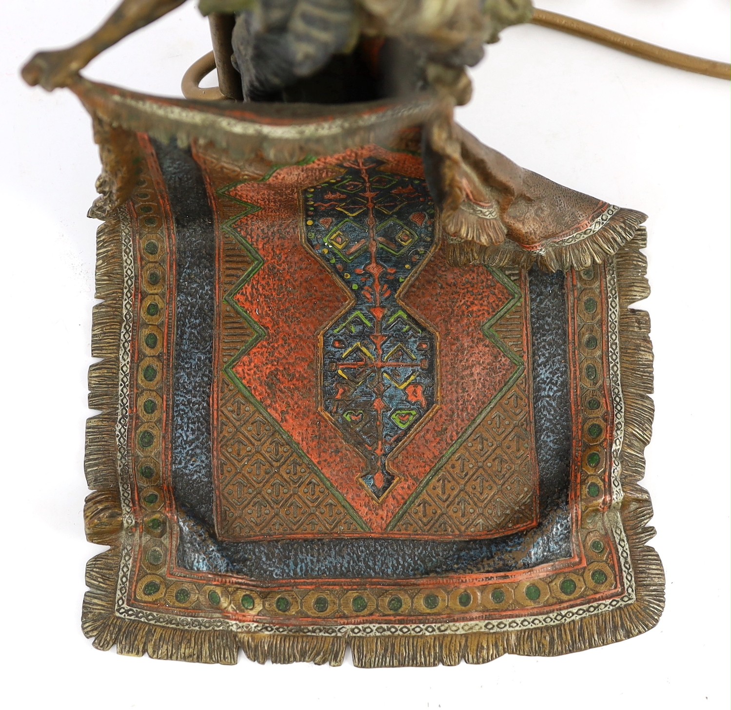 Franz Bergman (Austrian, 1861-1936). A cold painted bronze table lamp 'The Carpet Seller', 51cm high